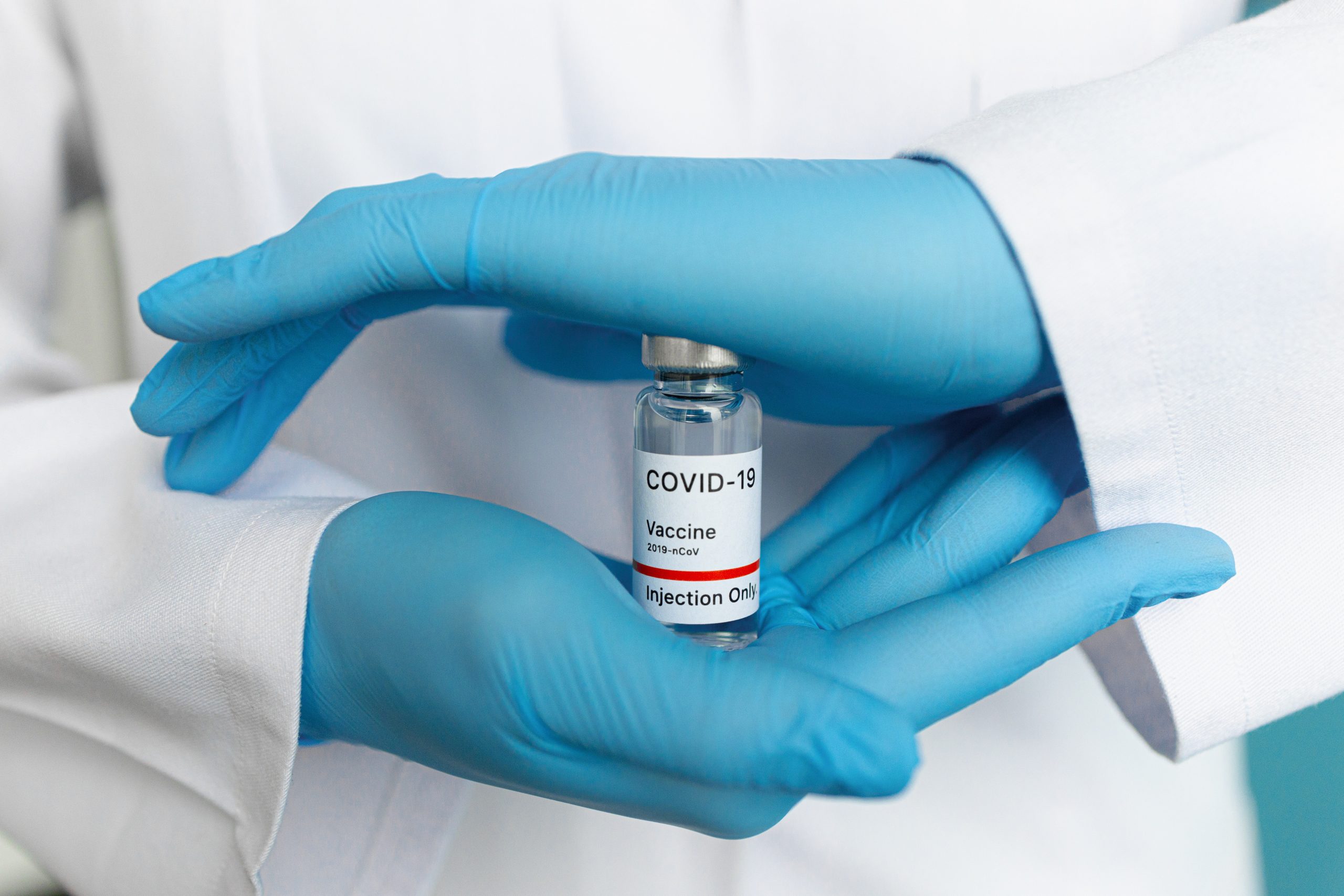 Одна реакция на вакцину, которая означает, что вы заразились COVID-19