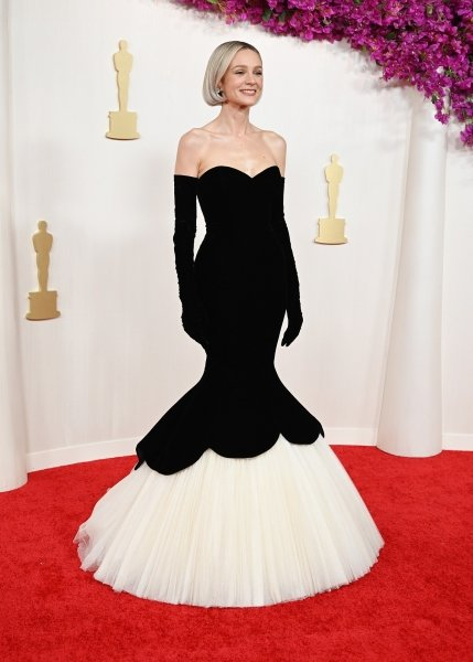 Элегантность и утонченность Андре Тан определяет самые привлекательные образы на церемонии Оскар 2024.